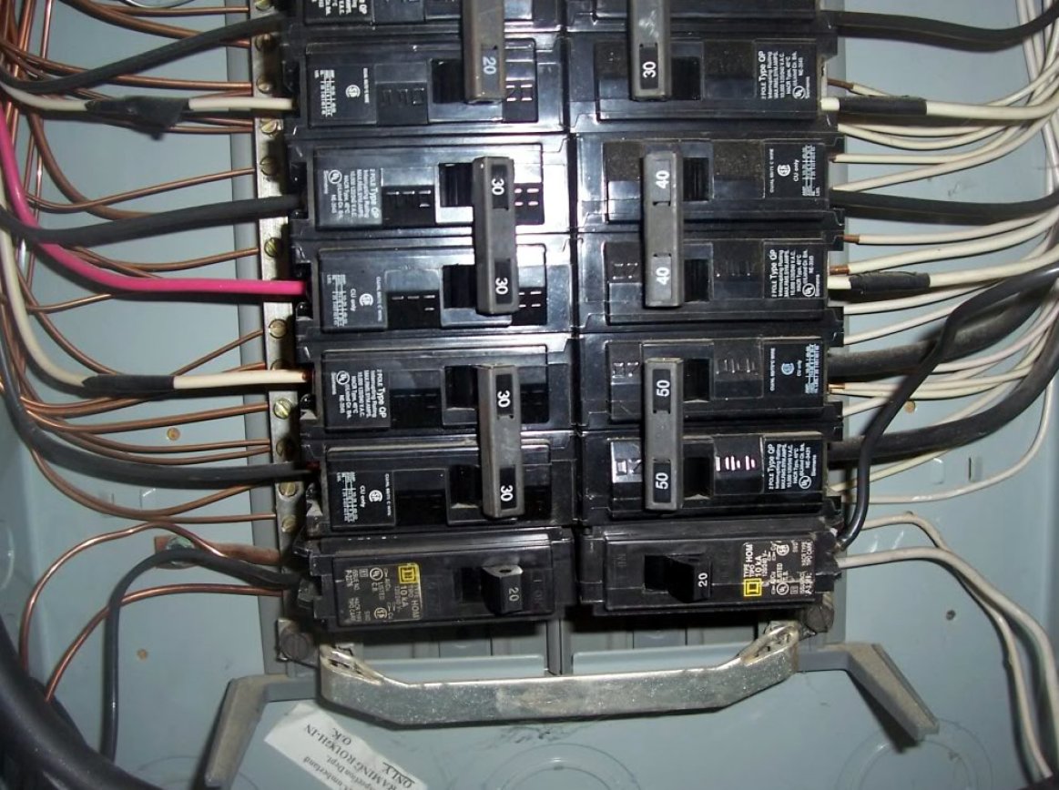 An Electrical Panel with AC Breakers