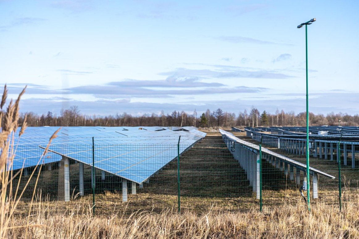 Electrical farm with ground mount solar array installation.
