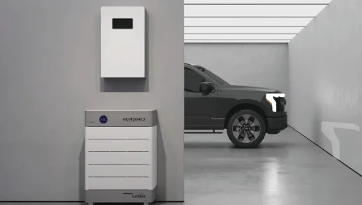 HomeGrid battery in garage with ford truck
