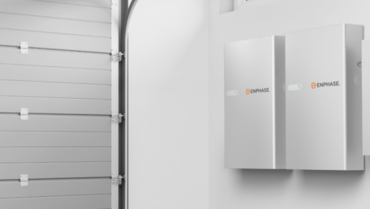 Enphase products displayed on the wall of a garage.