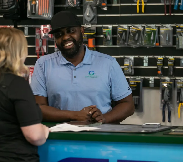 Greentech Renewables employees working customer service. 