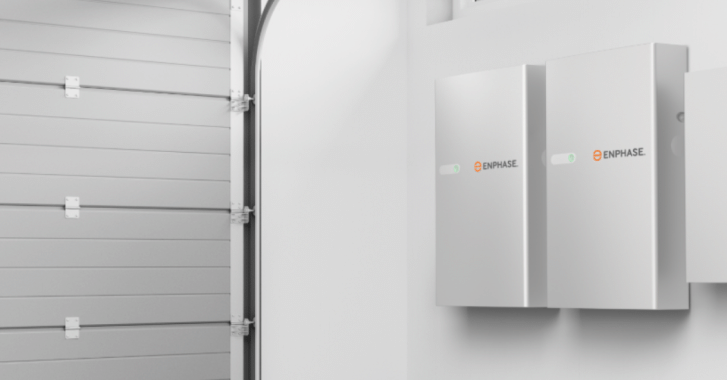 Enphase products displayed on the wall of a garage.