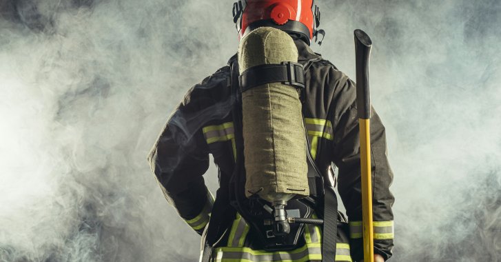 Firefighter on the job staying safe through standards like UL 3741.