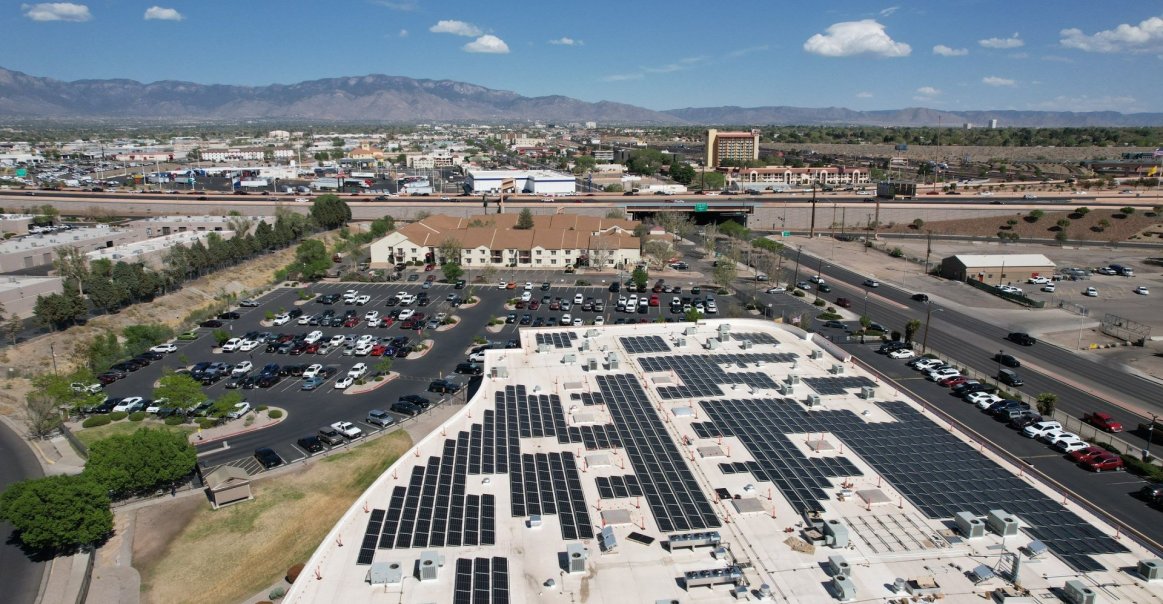Rooftop view of commercial solar panels in Albuquerque, NM.