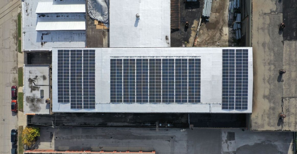 Commercial Rooftop Solar Installation Aerial View Industrial Fence Commercial Solar Installation