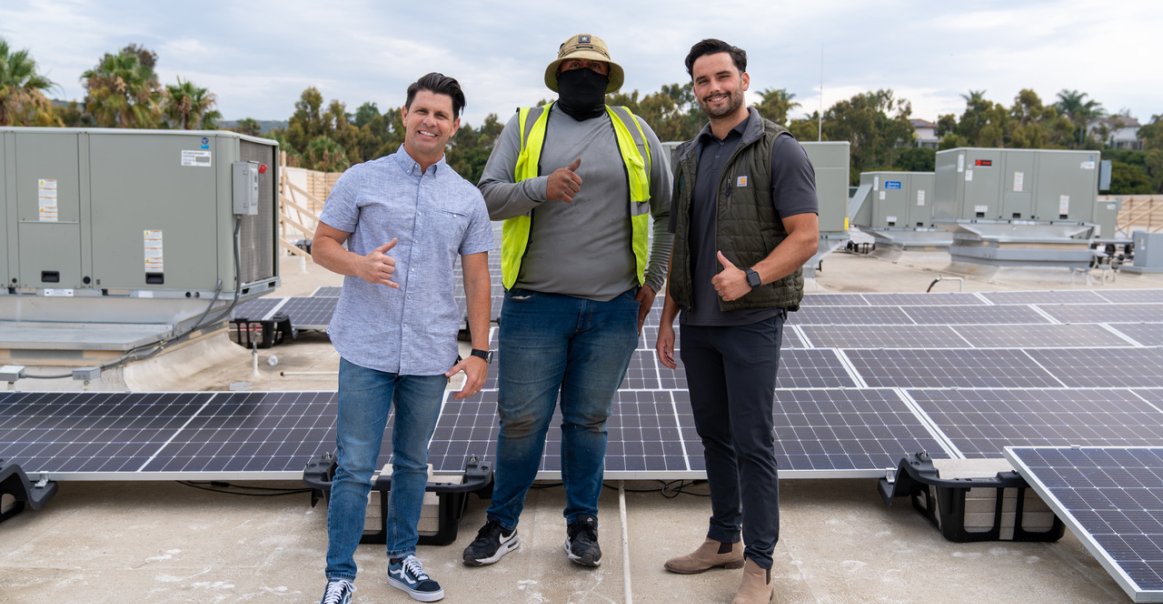 Installation team and Greentech Renewables at commercial solar installation site. Installation team and Greentech Renewables at commercial solar installation site.