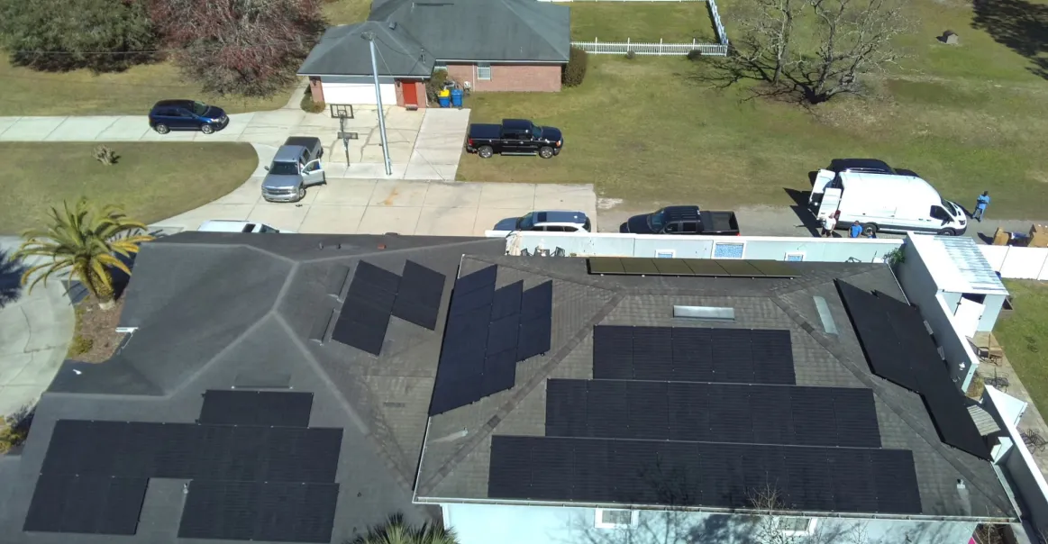 Bird's eye view of solar panels on rooftop solar installation in Jacksonville, FL.