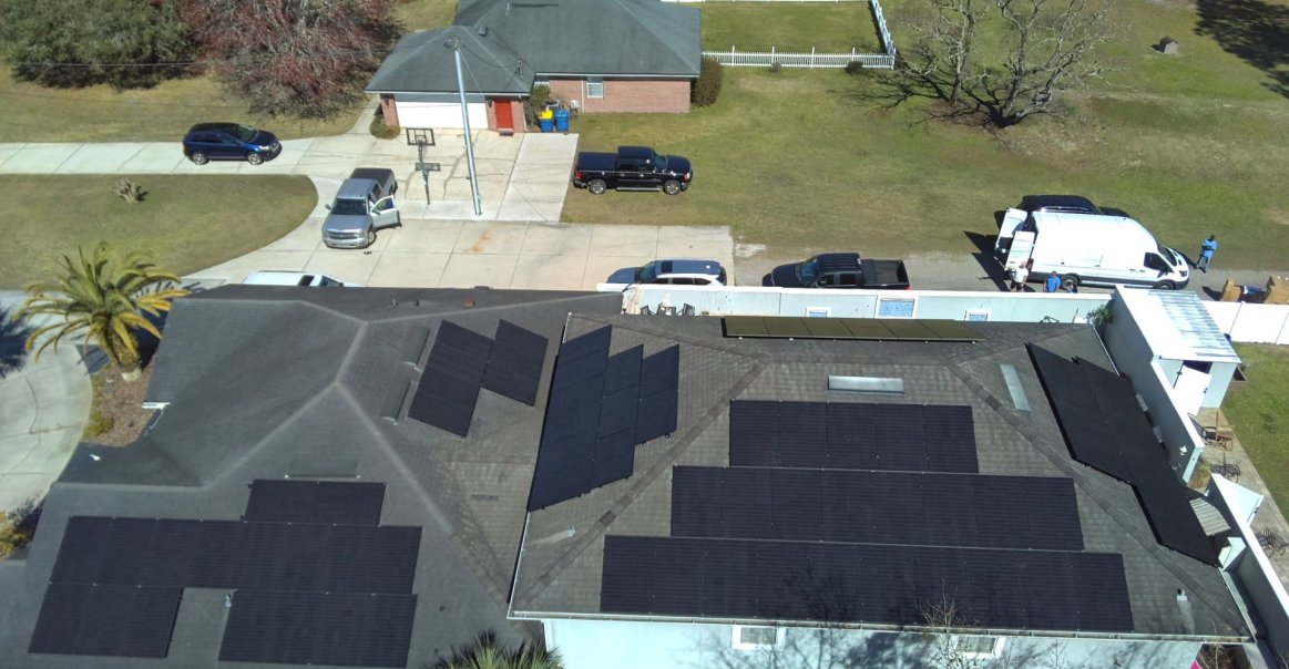 Bird's eye view of solar panels on rooftop solar installation in Jacksonville, FL.