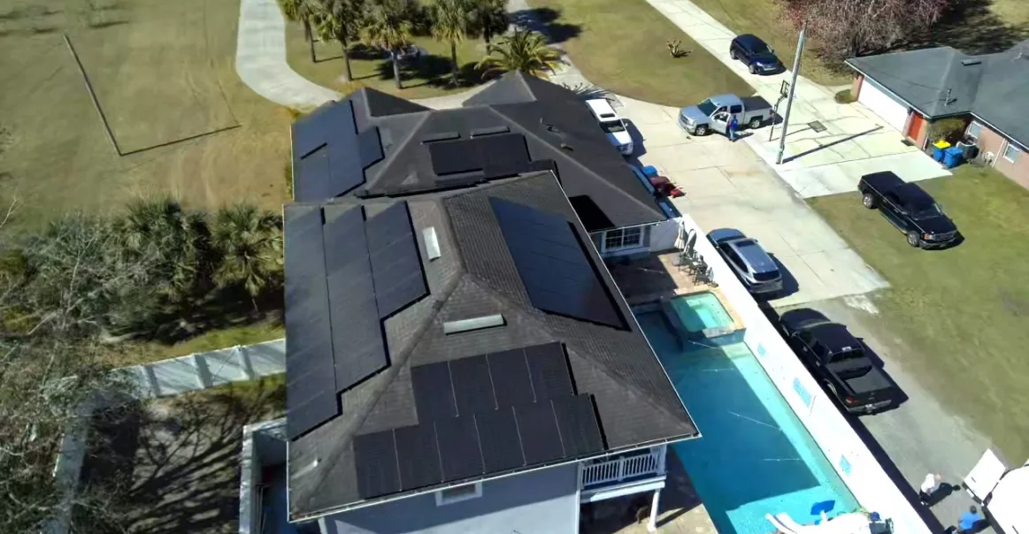 Bird's eye view of solar panels on rooftop solar installation in Jacksonville, FL.