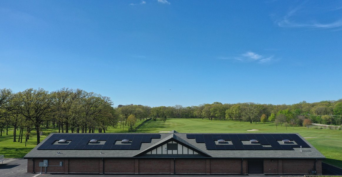 Jinko Photo Contest Commercial Winner Jinko Modules on Golf Course Roof