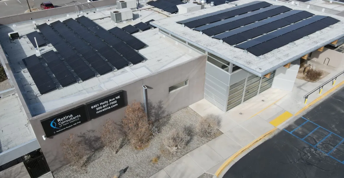 Rooftop view of commercial solar installation project at medical facility.