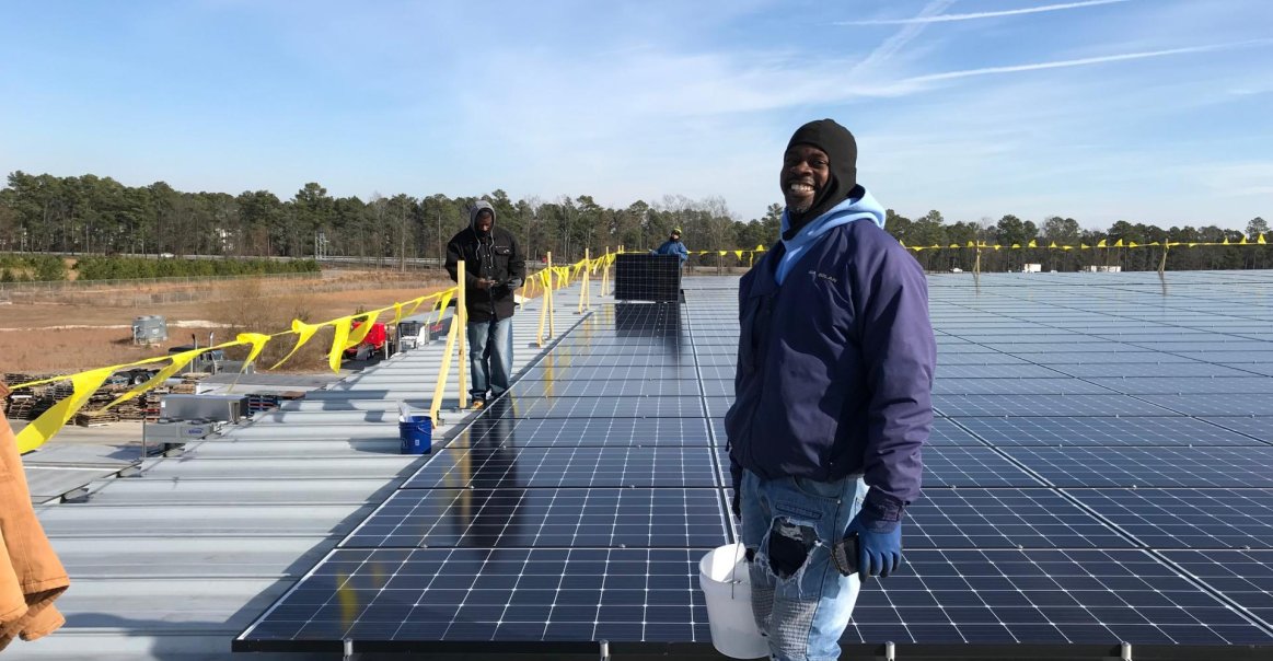 Solar Installer Working at the Job Site