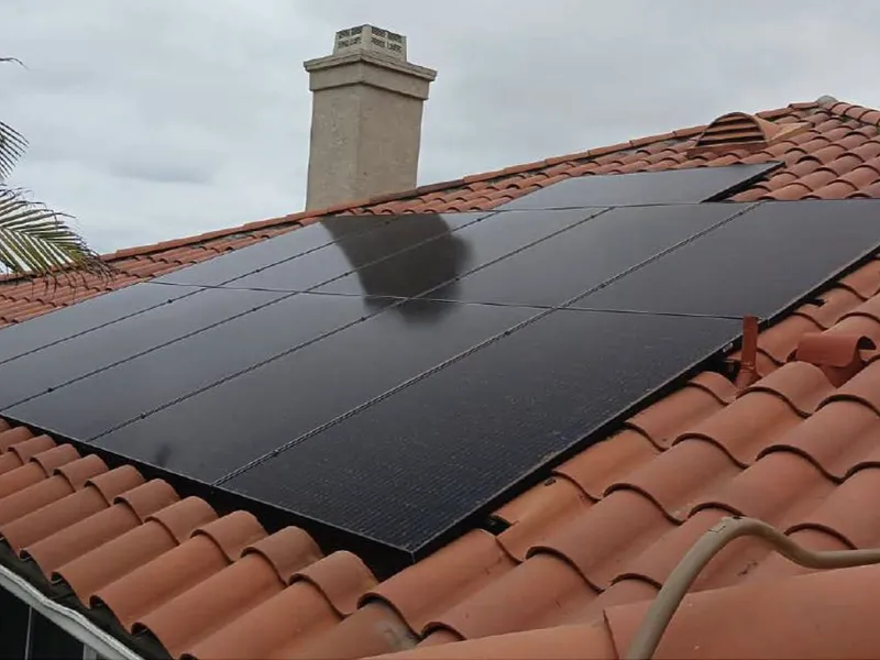 Side view of solar panels from a residential installation.