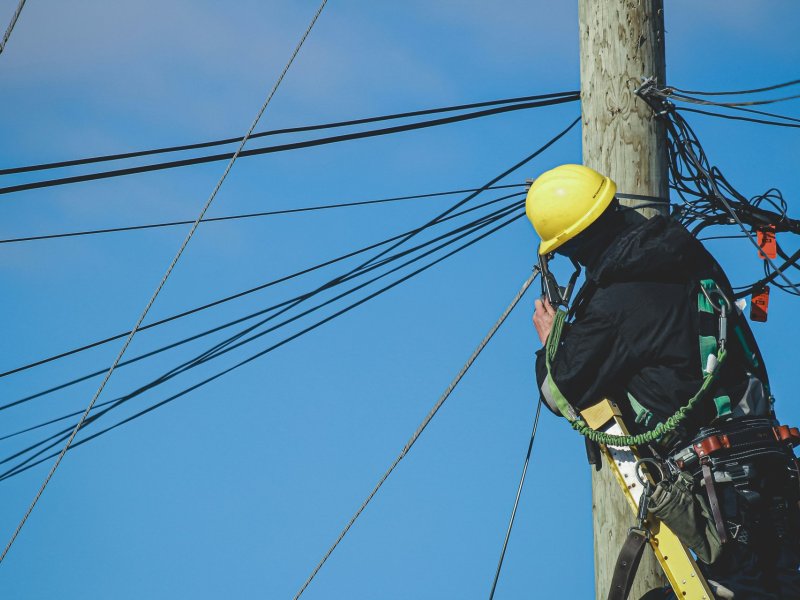 Utility worker doing maintenance during power outage