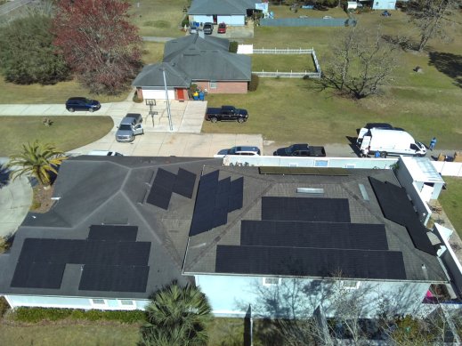 Bird's eye view of solar panels on rooftop solar installation in Jacksonville, FL.