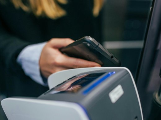 Generic image showing customer paying directly. 