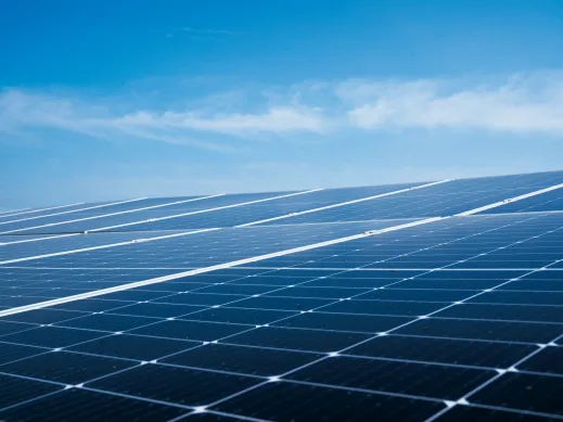 Solar panels under blue sky